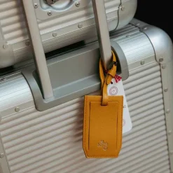 X Pineider Mustard Logo Luggage Tag^ISSIMO Clearance